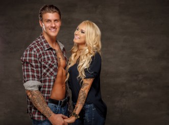 Nice smiling couple of athletic man and slim blond woman.